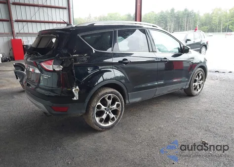 2016 Ford Escape Titanium z USA, uszkodzony, nr VIN 1FMCU9J99GUB10501